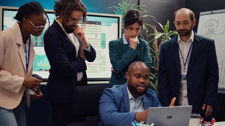 group of colleagues looking at a scene